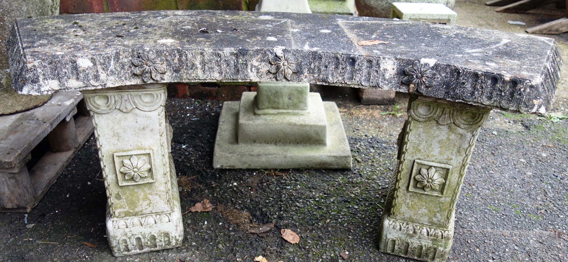 Appraisal: A composition stone sundial on square baluster column cm high