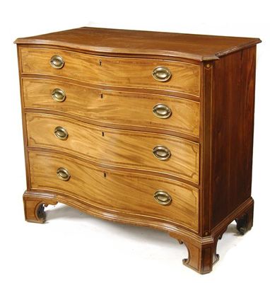 Appraisal: A George III mahogany serpentine chest the moulded edge top