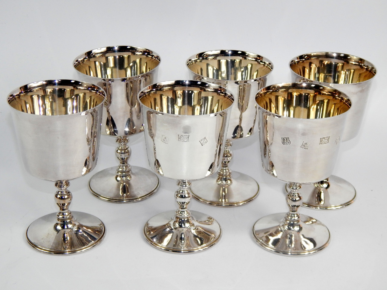 Appraisal: A set of six silver goblets raised on baluster turned