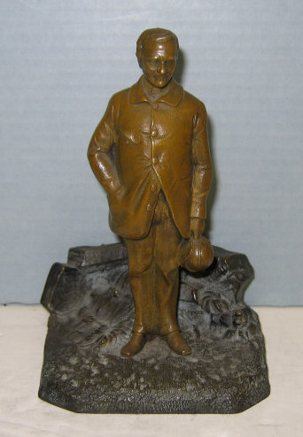 Appraisal: CONTINENTAL CAST BRONZE FIGURE Depicting a man holding a headland