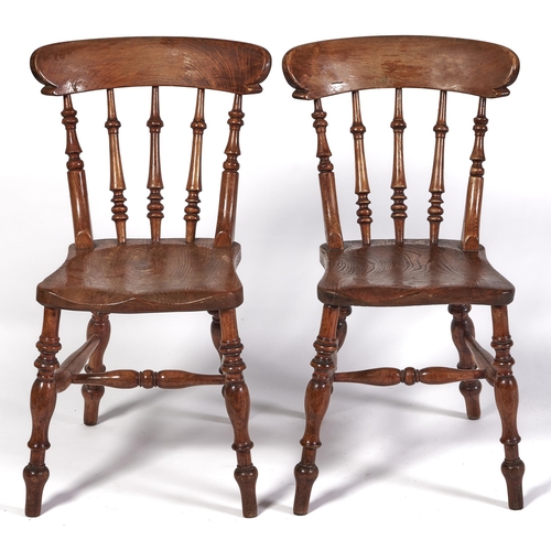 Appraisal: A pair of Edwardian ash kitchen chairs probably Derbyshire Ilkeston