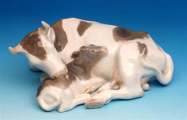 Appraisal: A Royal Copenhagen cow and calf wide