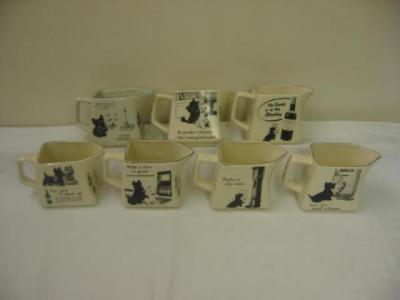 Appraisal: Seven black and white whisky jugs Nos - of a