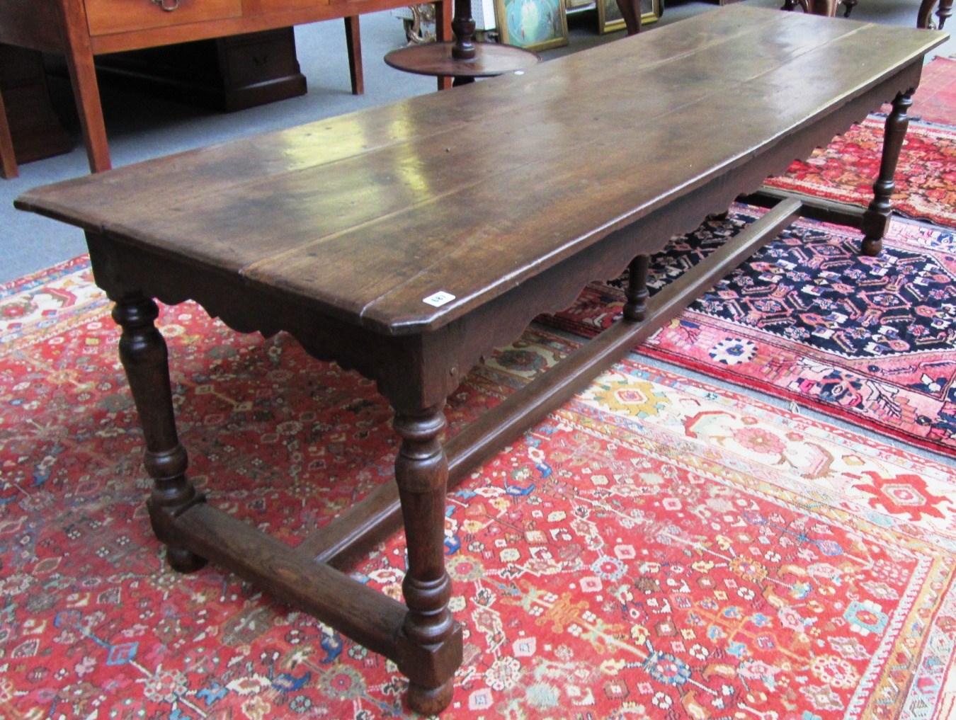 Appraisal: An early th century French oak farmhouse table the canted