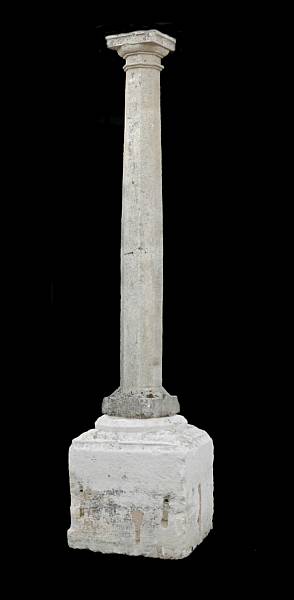 Appraisal: A Continental Neoclassical limestone column on plinth th century The