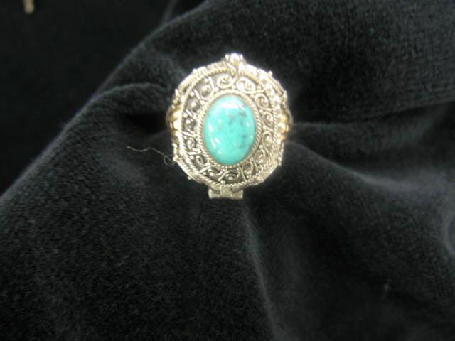 Appraisal: Sterling Silver Gold Poison Ring compartment hidden under rich blue