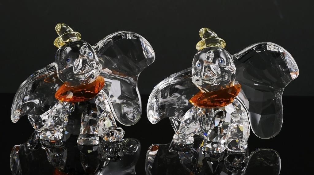 Appraisal: Two retired Swarovski Disney Dumbo figurines This retired Swarovski crystal