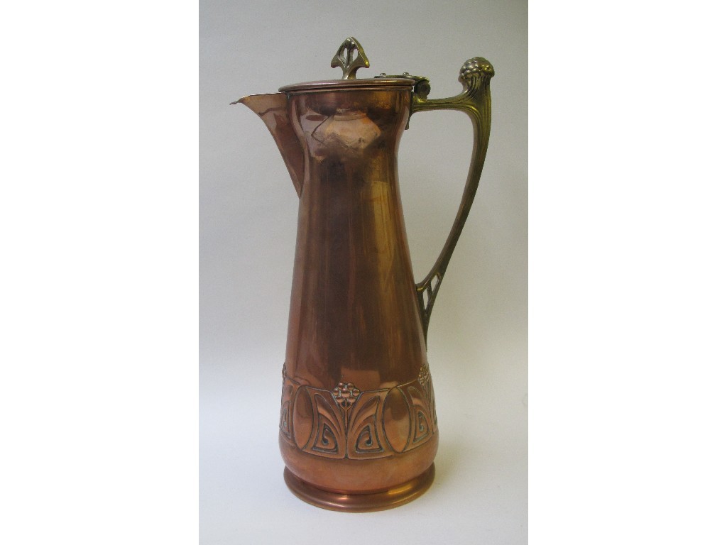 Appraisal: A Secessionist copper embossed coffee pot and a two-handled tray