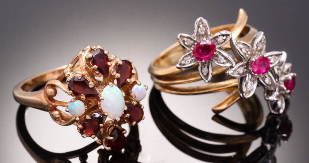 Appraisal: TWO VINTAGE GOLD AND GEMSTONE RINGS American mid-late th century