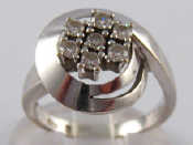 Appraisal: A white metal tests carat gold diamond cluster ring head