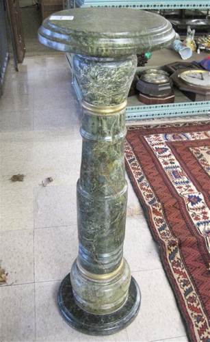 Appraisal: VERDE MARBLE PEDESTAL the baluster-turned green marble column with round