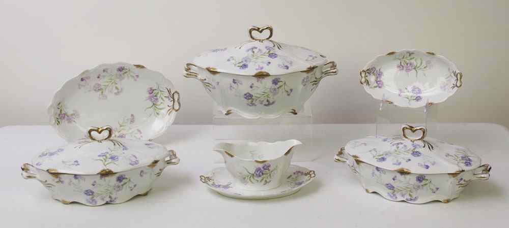 Appraisal: FRENCH LIMOGES CHINA SERVING PIECES Charles Ahrenfeldt decorated in lavender