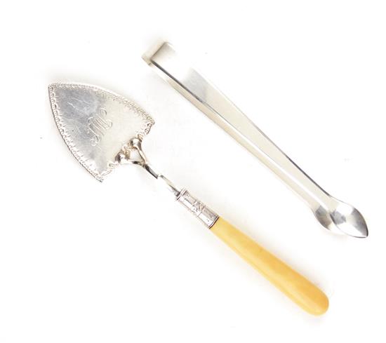 Appraisal: George III sterling silver pudding trowel and tongs Robert Hennell