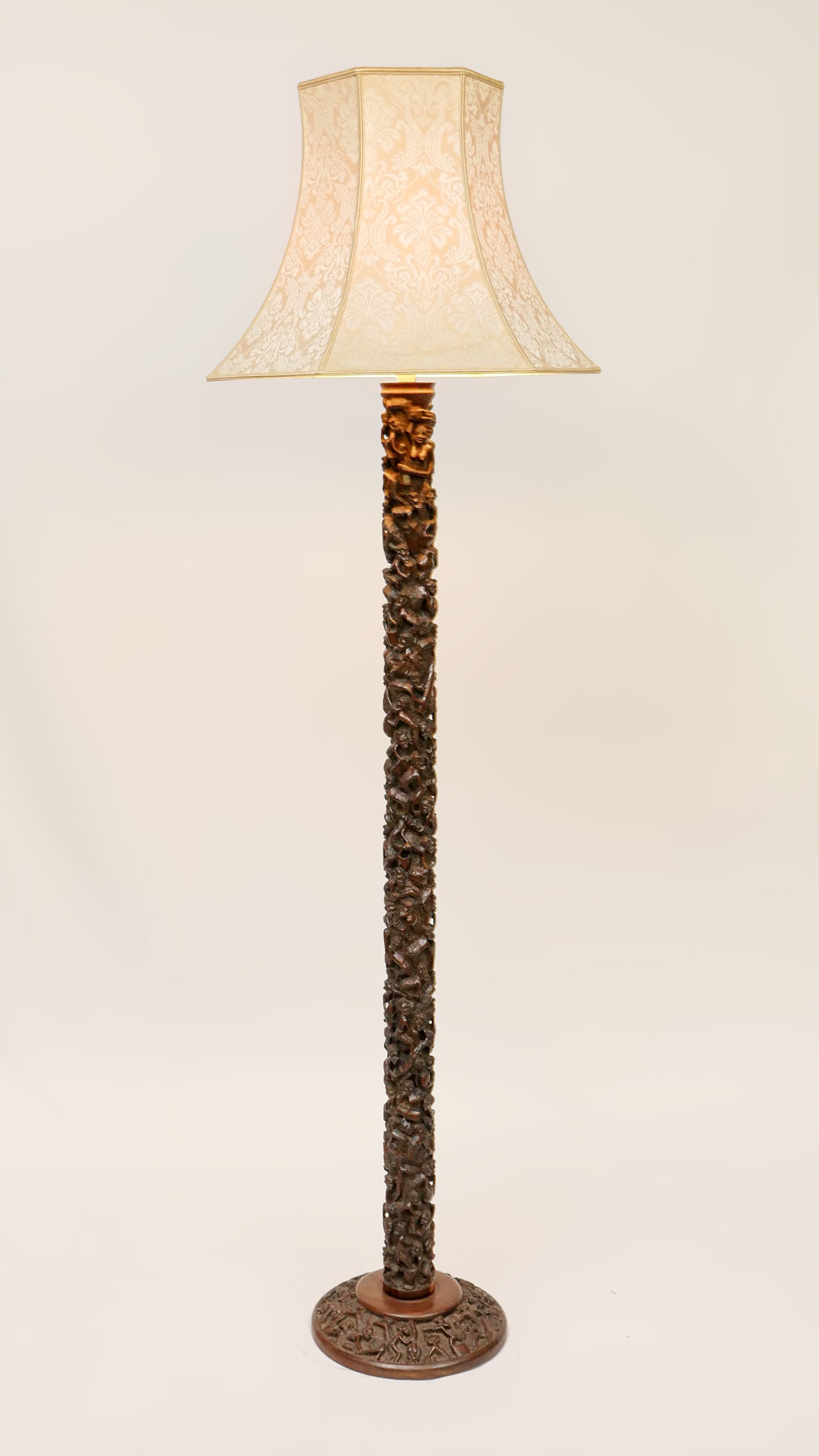 Appraisal: CARVED AFRICAN FIGURAL FLOOR LAMP Elaborately carved African floor lamp