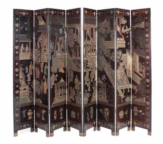 Appraisal: A Chinese Coromandel Eight Panel Floor Screen depicting cranes among