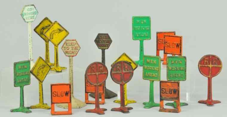 Appraisal: LARGE GROUPING OF CAST IRON ROAD SIGNS Assorted colors and