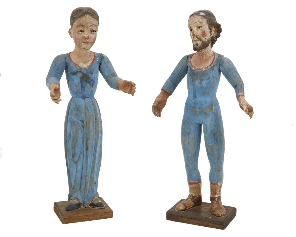 Appraisal: A pair of santos figures th Century The polychromed carved