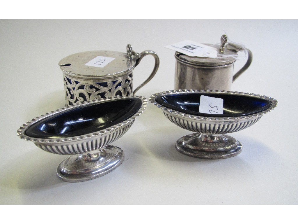 Appraisal: Lot comprising two silver mustards and a pair of silver