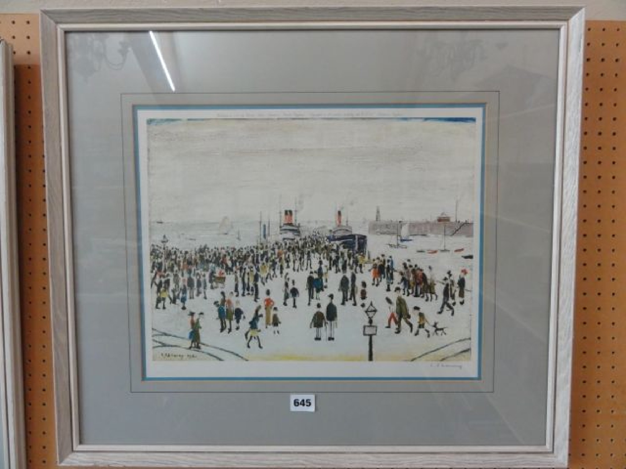 Appraisal: A signed coloured print after L S Lowry showing a