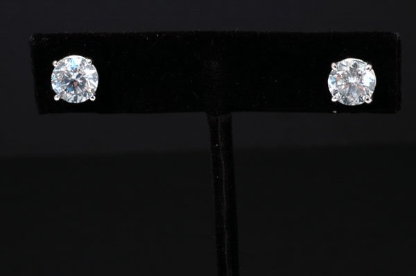 Appraisal: One pair of diamond stud earrings with wire basket settings