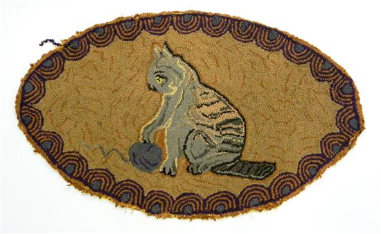 Appraisal: Oval hooked rug cat with ball of yarn some loss