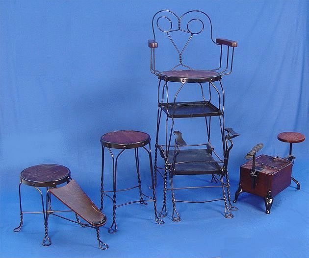 Appraisal: PIECE WROUGHT IRON SHOE SHINE STANDS High client chair ''