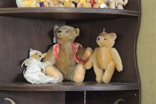 Appraisal: THREE TEDDY BEARS Two Steiff bears one wearing a nightgown