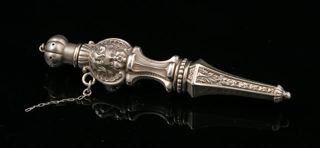 Appraisal: Modeled as a Renaissance baton h With cherub faces and