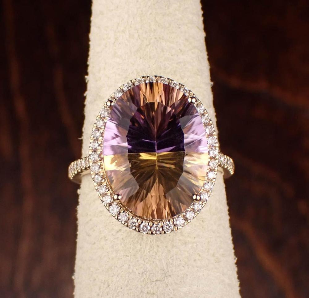 Appraisal: AMETHYST CITRINE AND FOURTEEN KARAT GOLD RING The yellow gold