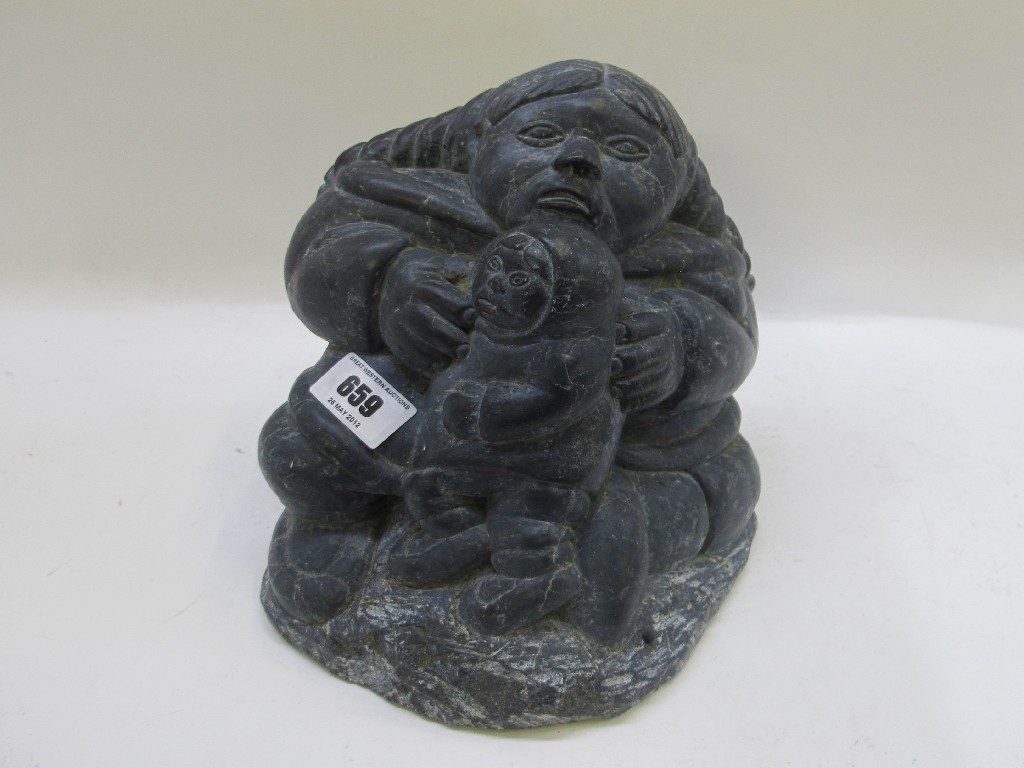 Appraisal: Innuit carved stone group of a mother and child by