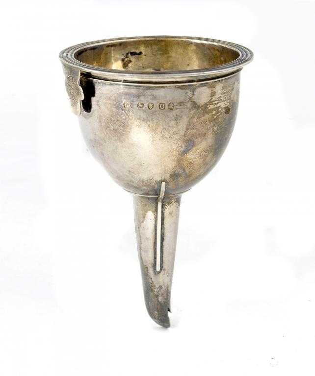 Appraisal: A GEORGE III WINE FUNNEL with reeded rim and clip