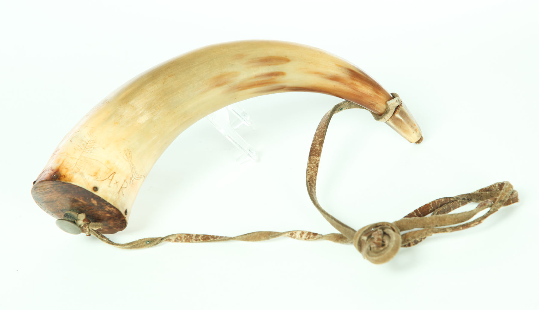 Appraisal: CARVED POWDER HORN American th century Pine plug with pewter