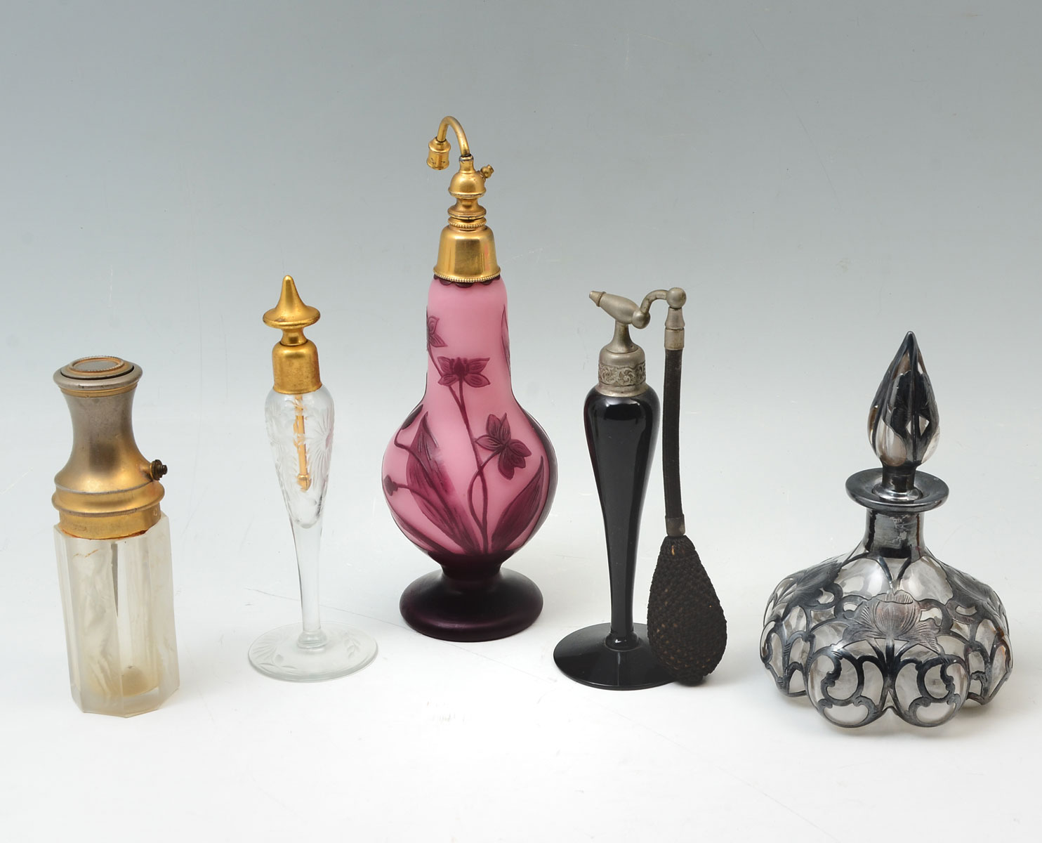 Appraisal: PC ART GLASS PERFUME BOTTLES ATOMIZERS Comprising - Black glass