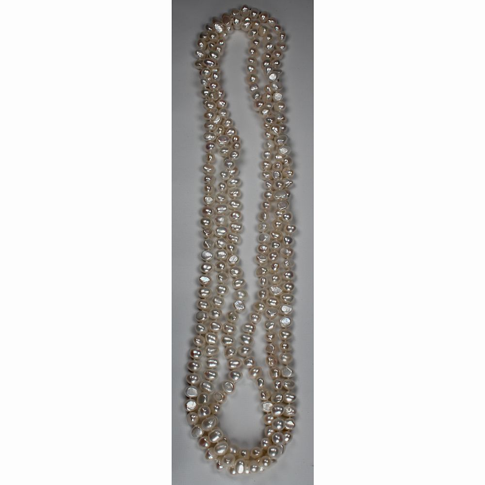 Appraisal: Unusual inch Strand of White Freshwater Pearls Unusual inch Strand