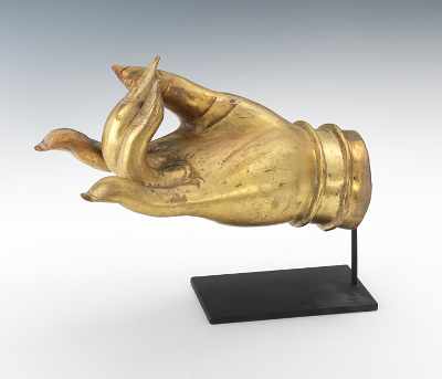 Appraisal: An Oversized Gilt Hand of Buddha Gilt bronze cast hollow