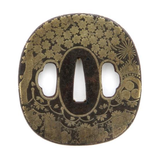 Appraisal: An Iron Kenjo Tsuba having gold decoration of a flowering