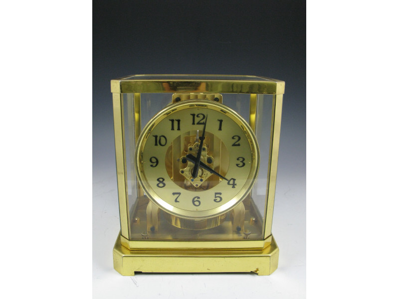 Appraisal: Le Coultre Swiss Atmos Clock th c brass and glass