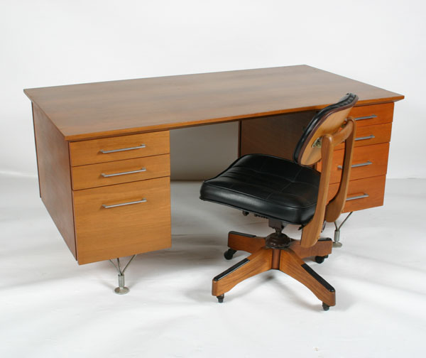 Appraisal: Mid-century modern desk and chair wood desk with seven locking