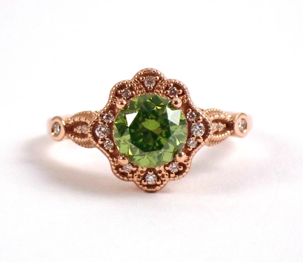 Appraisal: VINTAGE DESIGN GREEN DIAMOND AND FOURTEEN KARAT GOLD RING The