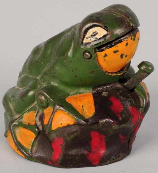 Appraisal: Cast Iron Frog on Rock Mechanical Bank Manufactured by Kilgore