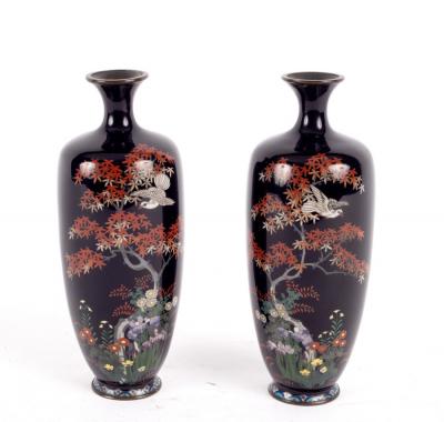 Appraisal: A pair of Japanese cloisonn baluster vases decorated birds in