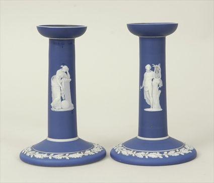 Appraisal: Pair of Wedgwood Dark Blue Jasperware Candlesticks in