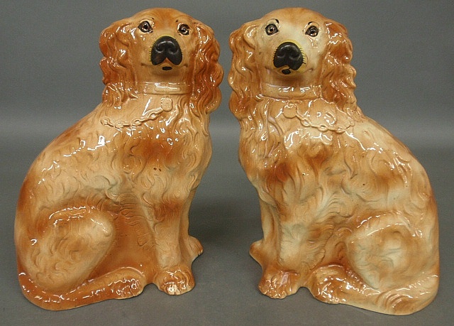 Appraisal: - Large pair of Staffordshire spaniels with glass eyes c