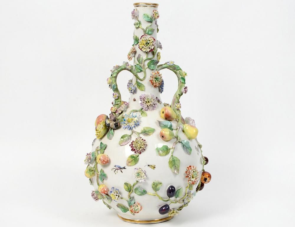 Appraisal: GERMAN FLORAL ENCRUSTED PORCELAIN VASE Late th Century Of bottle