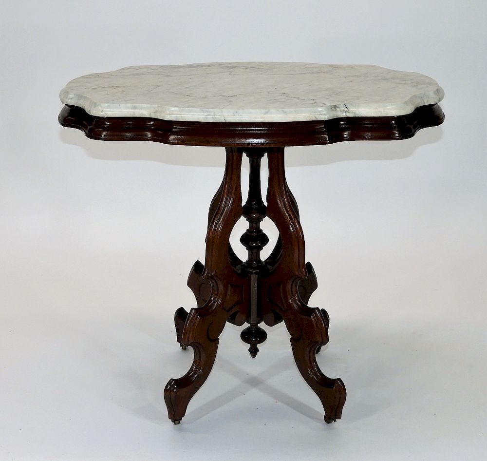 Appraisal: Victorian Walnut Turtle Marble Top Table United States Circa Turtle