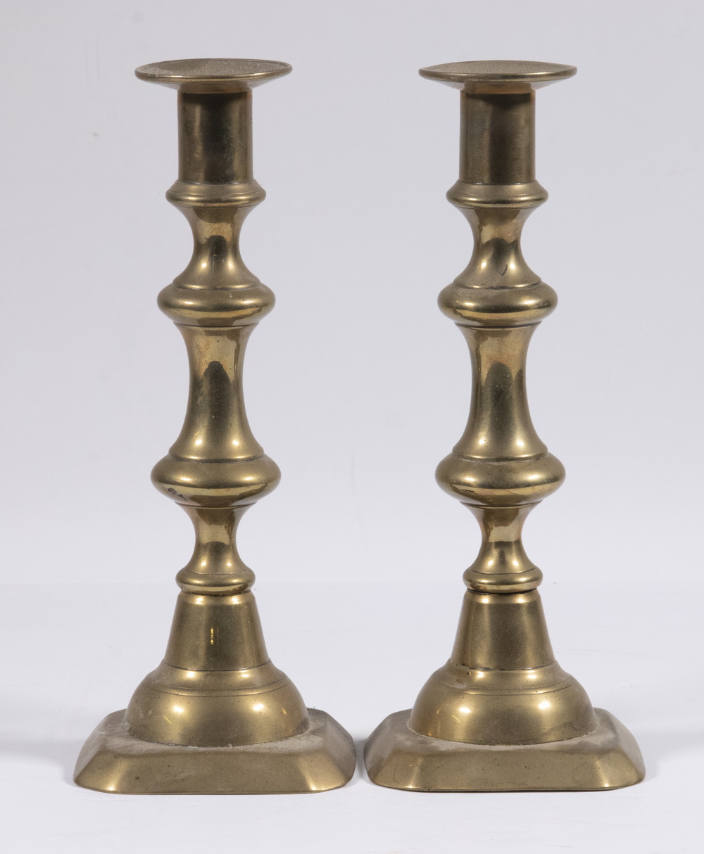 Appraisal: PR BRASS PUSH-UP CANDLESTICKS Pair of English th c Candlesticks