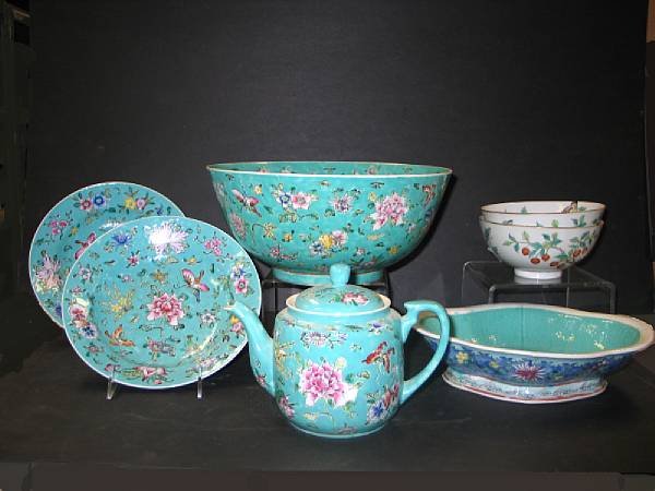 Appraisal: Four Hong Kong-decorated turquoise ground porcelains with famille rose decoration