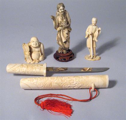 Appraisal: Three Japanese ivory okimono and bone cased tanto th century