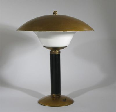 Appraisal: A Modernist enamelled metal desk lamp flat domed shade with