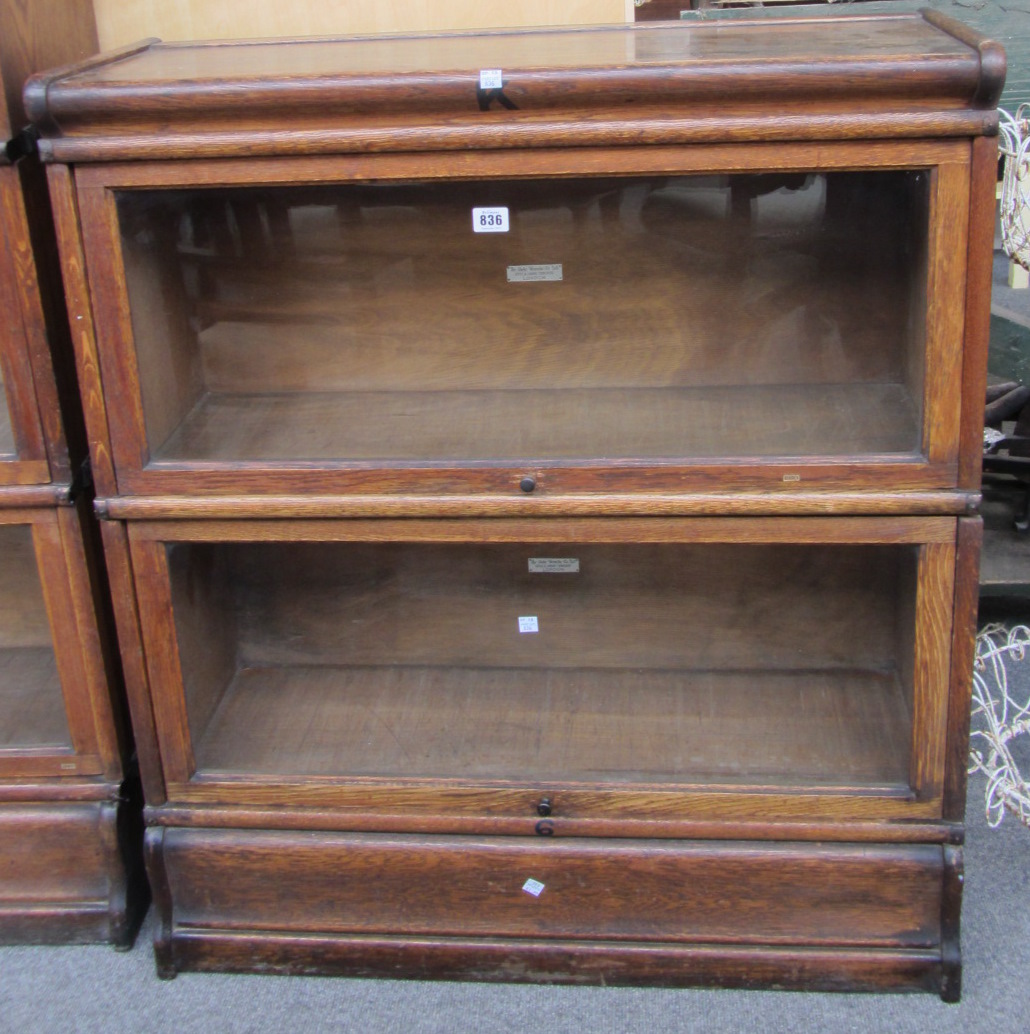 Appraisal: A th century oak Globe Wernicke two section bookcase cm